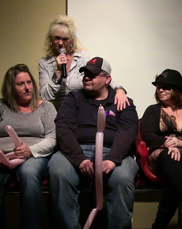 Audience volunteers on stage during a stage hypnosis show
